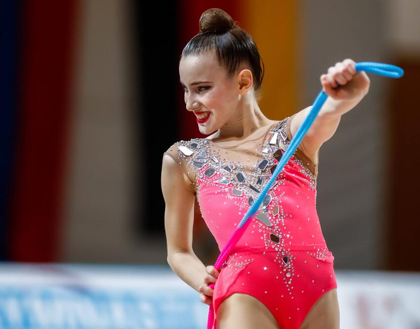 России оказалась не нужна: наша гимнастка стала пятикратной чемпионкой мирапод флагом Германии